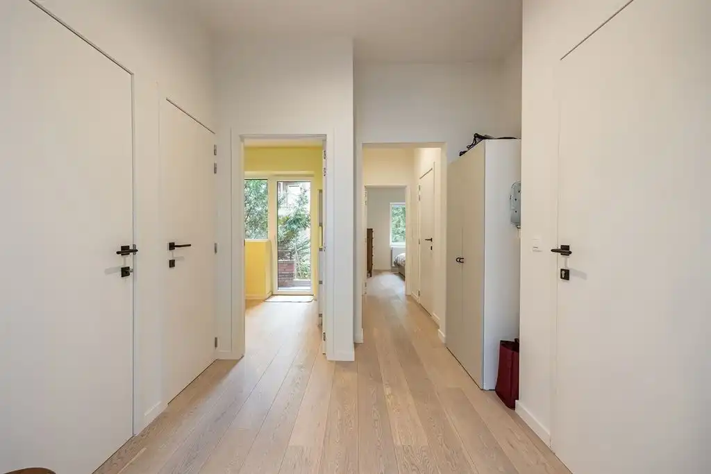 Instapklaar appartement met ruime tuin foto 8