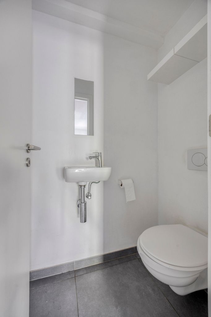 Instapklaar gelijkvloers appartement met eigen tuin foto 14