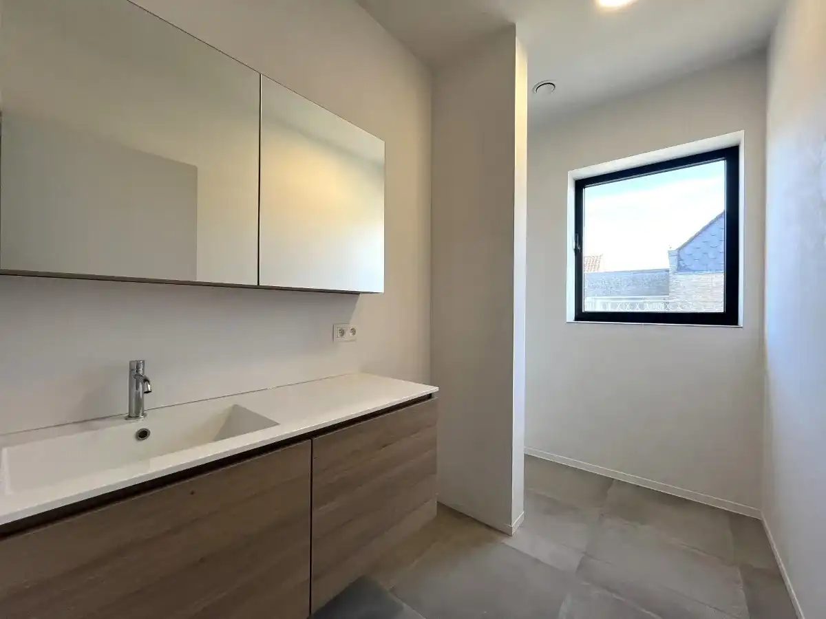 Beselare – Gelijkvloers nieuwbouwappartement met tuin en oprit foto 9