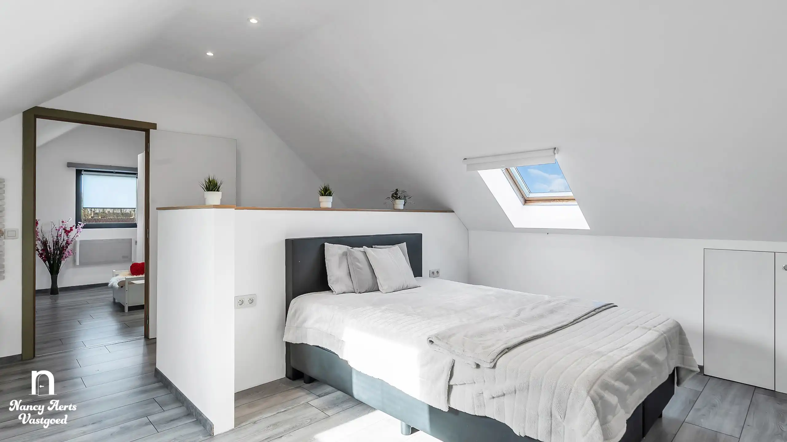 Karaktervolle duplex met loftgevoel en tuin in Zonhoven foto 18