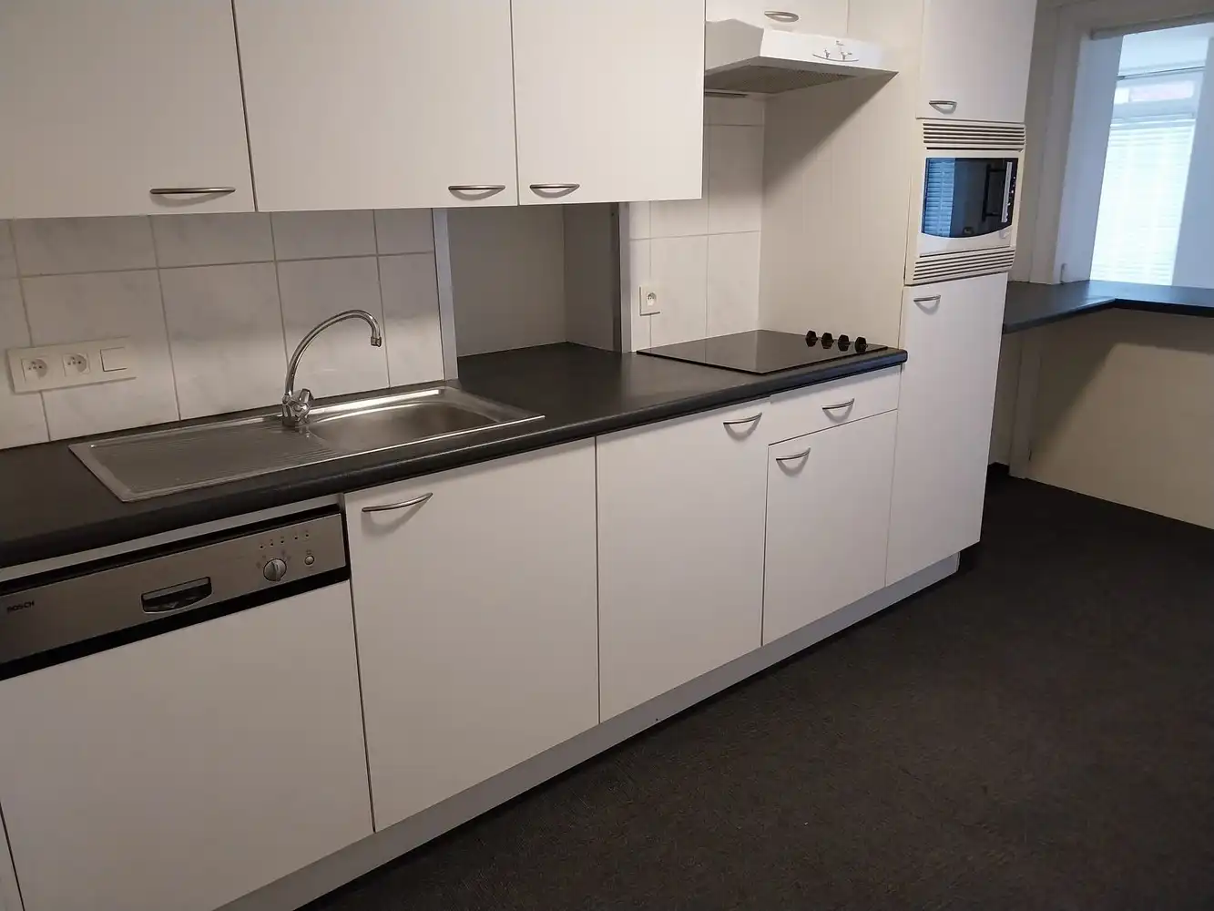 Luxe gelijkvloers appartement met grote tuin in Ruddervoorde foto 8