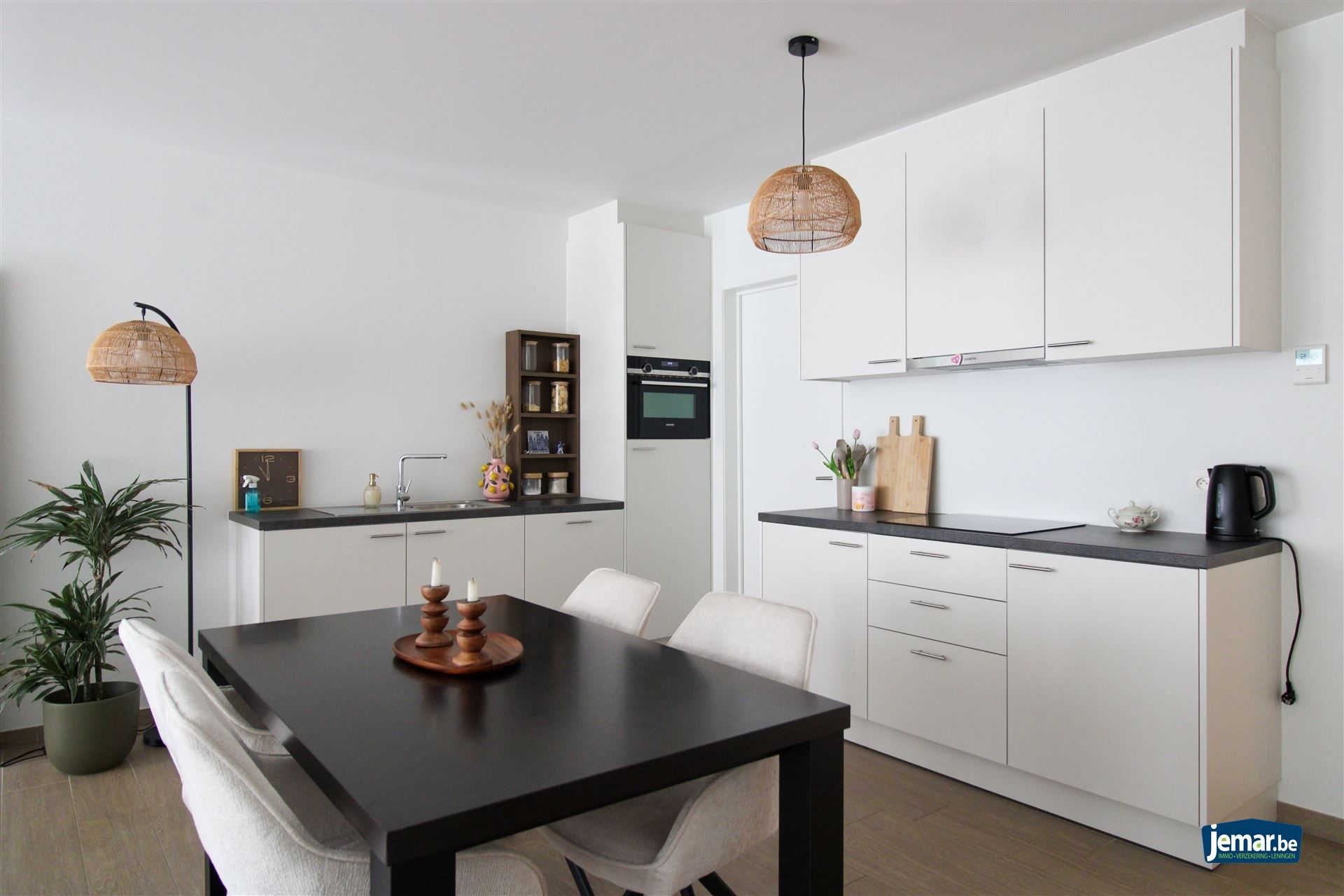 Instapklaar, gelijkvloers en energiezuinig appartement met terras en autostaanplaats in Opgrimbie! foto 4