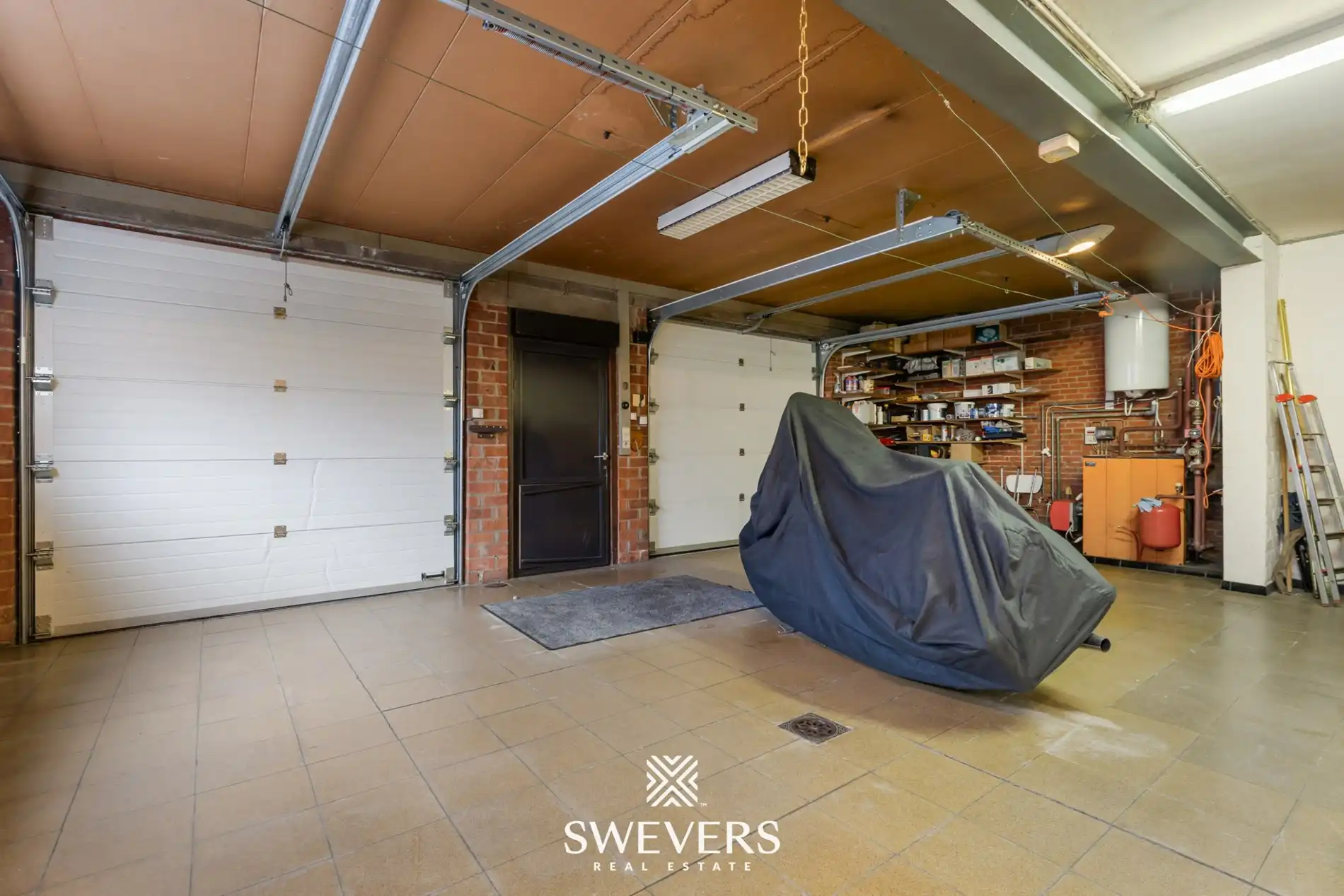 Opbrengsteigendom met handelspand, ruim appartement en uitbreidingspotentieel in hartje Heusden-Zolder foto 47