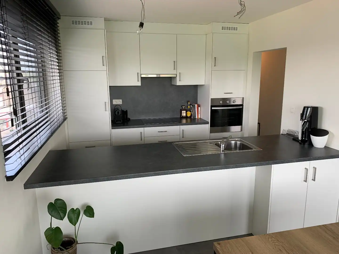 GEZELLIG APPARTEMENT MET 2 SLAAPKAMERS, TERRAS, KELDER EN 1 AUTOSTANDPLAATS TE BILZEN!  foto 11