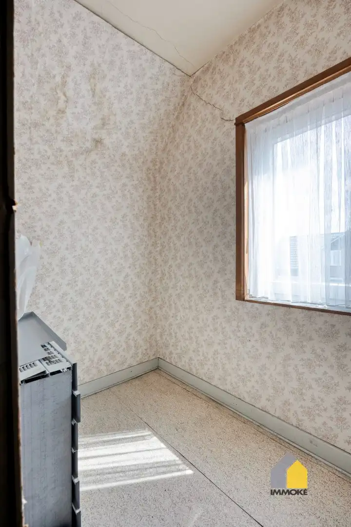 Te renoveren woning met 3 slpks op een perceel van 6 a 44 ca. foto 24