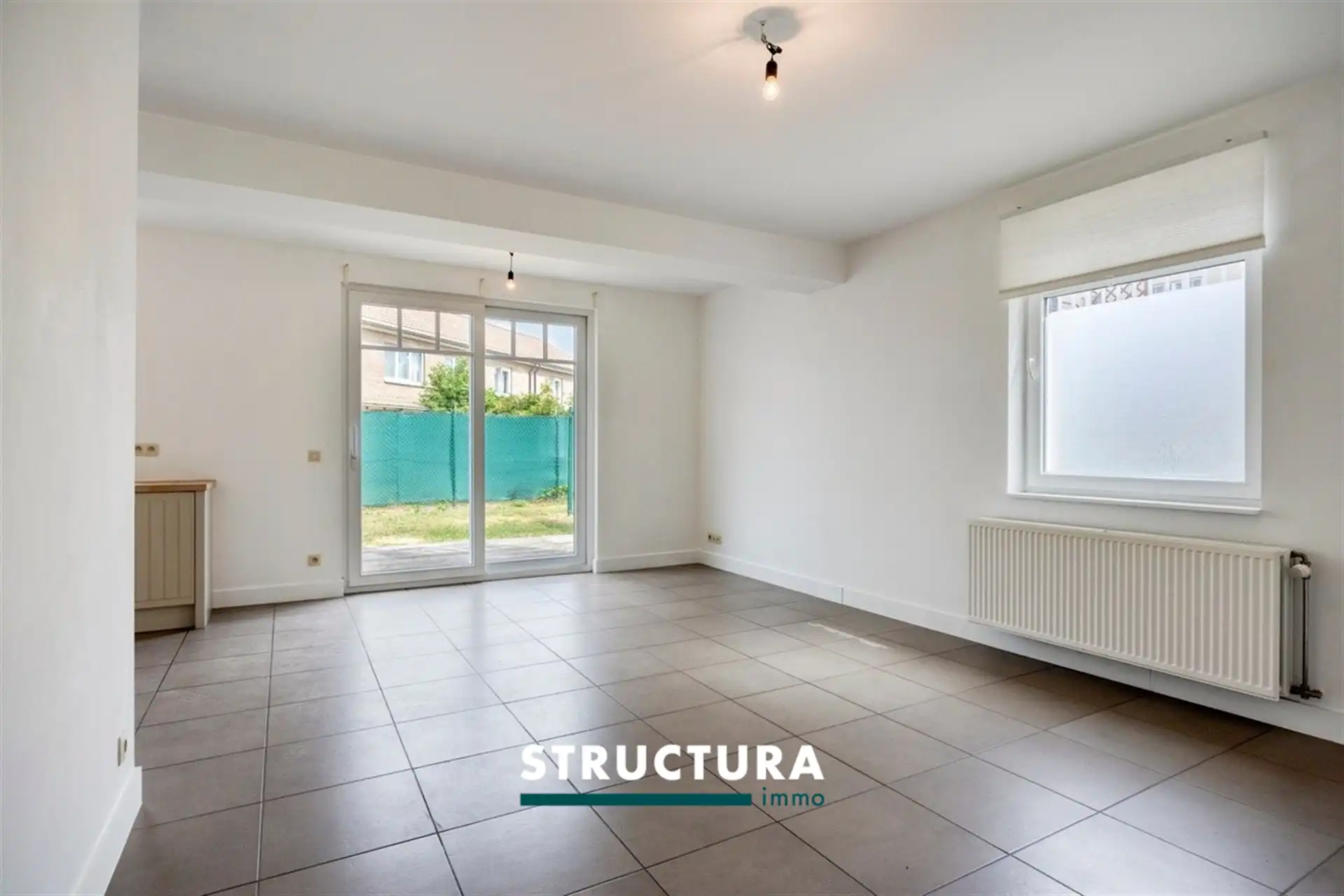 Gelijkvloers appartement met tuin nabij centrum foto 3