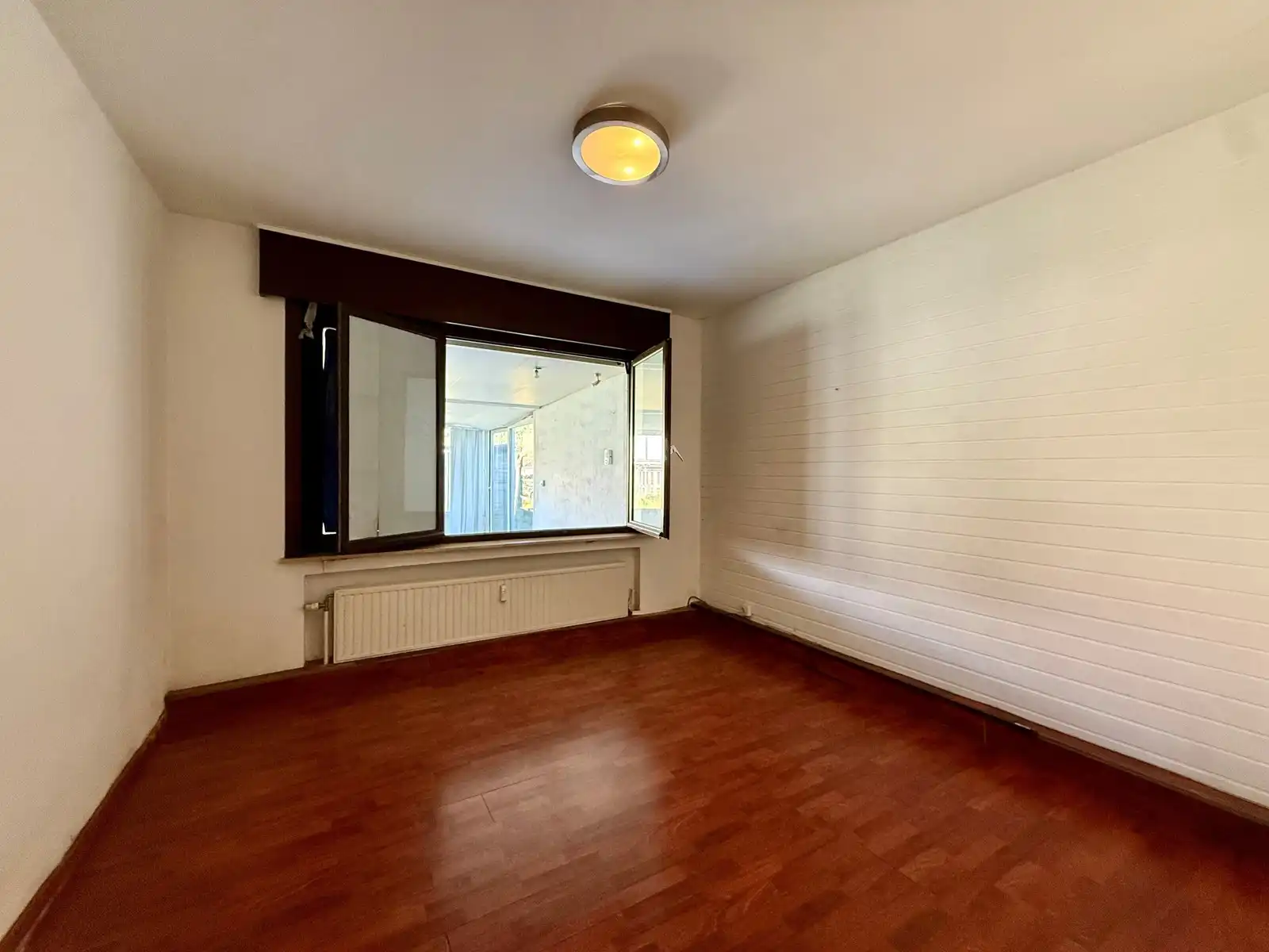 Te renoveren studio met ruime zuidwesttuin foto 9