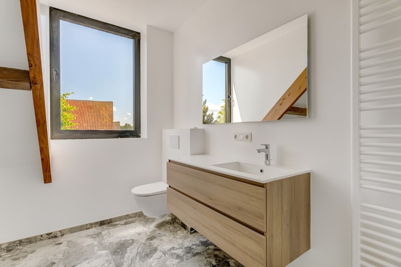 Rustig gelegen nieuwbouwwoning met 3 slpk. en toffe tuin foto 18