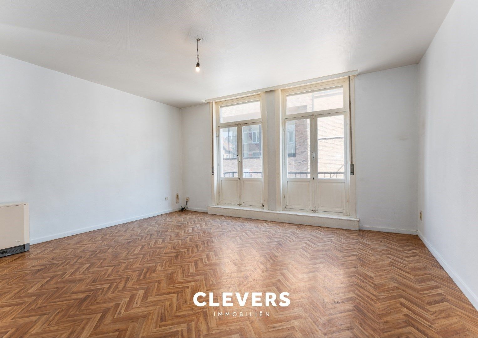 Leuk app. in het stadscentrum (1 grote en 1 kleine slpk) foto 2