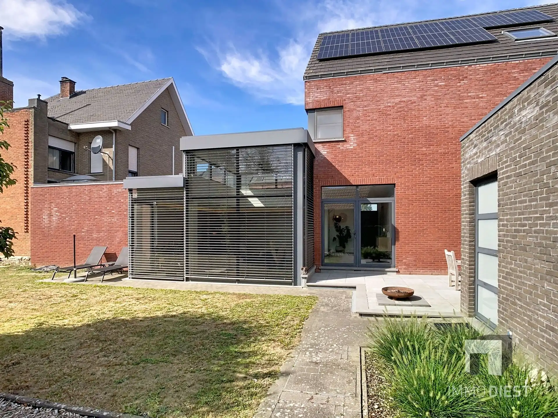 Moderne, lichtrijke woning met aangename tuin aan de voet van hartje Scherpenheuvel. foto 31