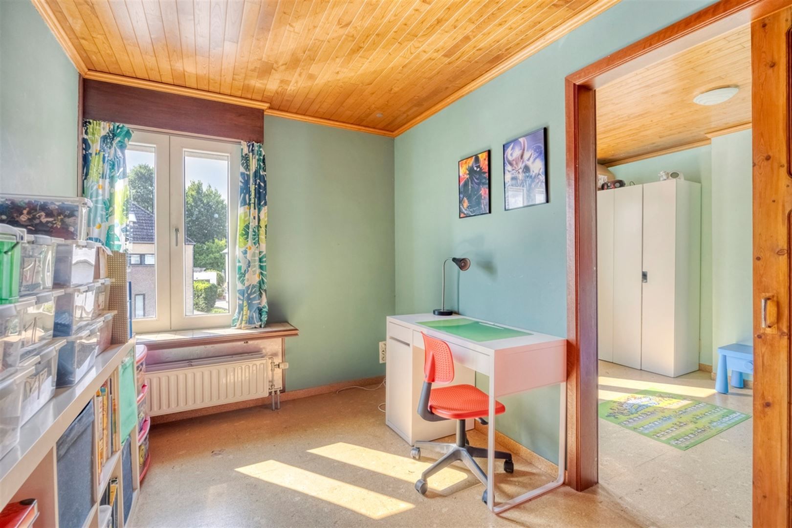 Ruime rijwoning met garage foto 16