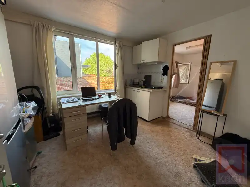 Gebouw met 11 kamerwoningen, centrum Geel op 8a66. foto 11
