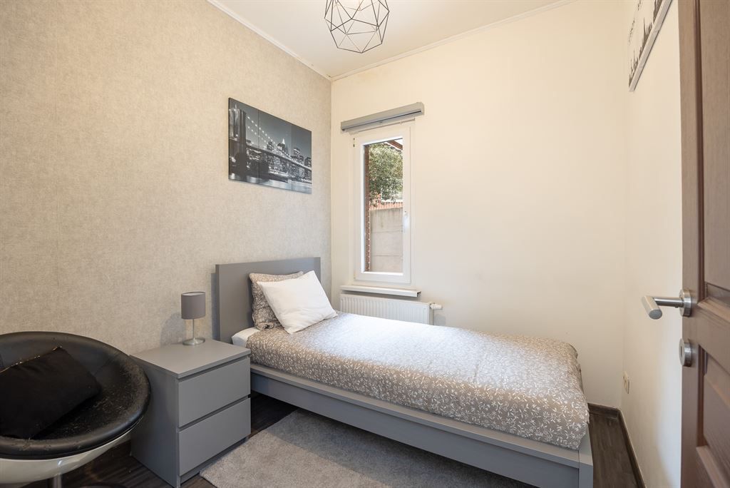 Gelijkvloers appartement met zonnige tuin foto 13