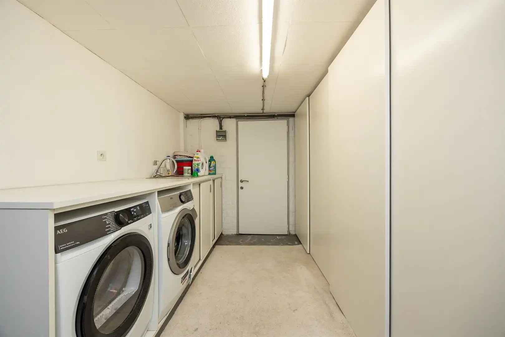Ruim opbrengsteigendom met lift, garage en verhuurde handelsruimte foto 24
