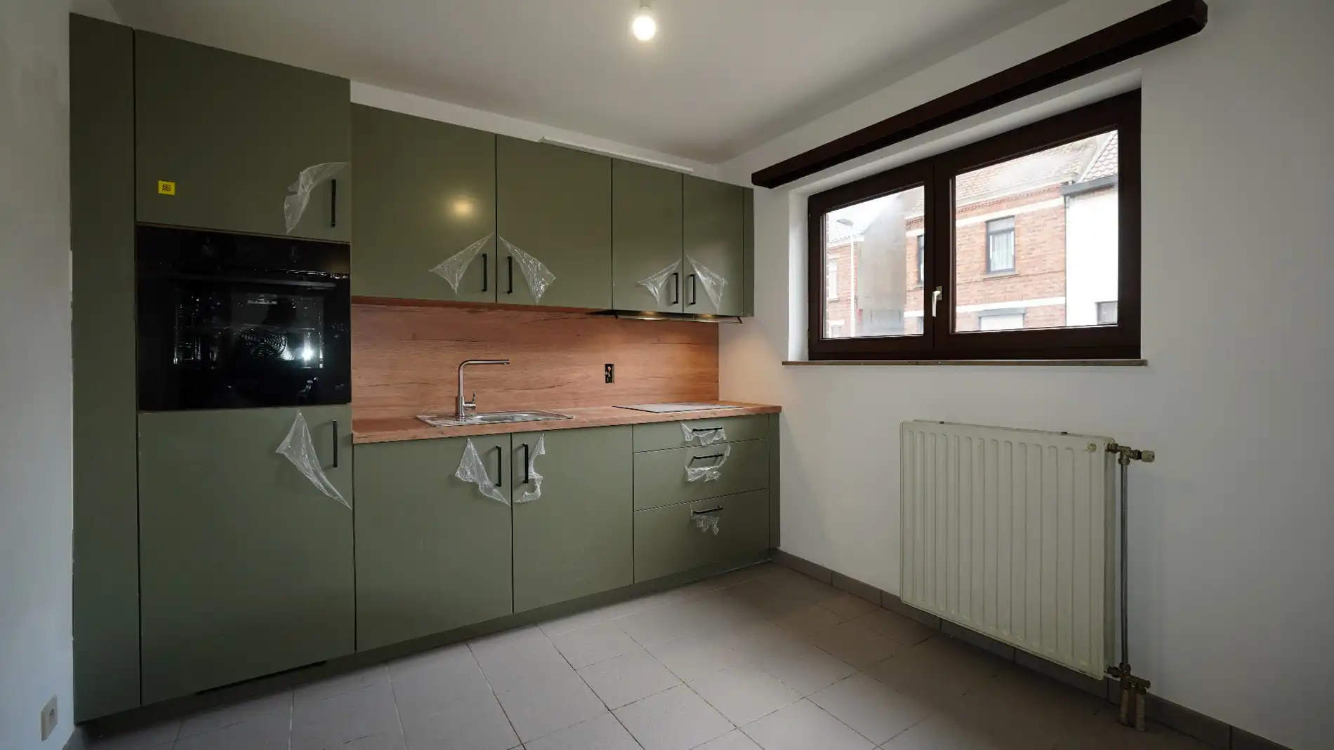 Gelijkvloers appartement met 1 slaapkamer en garage te Lokeren foto 2