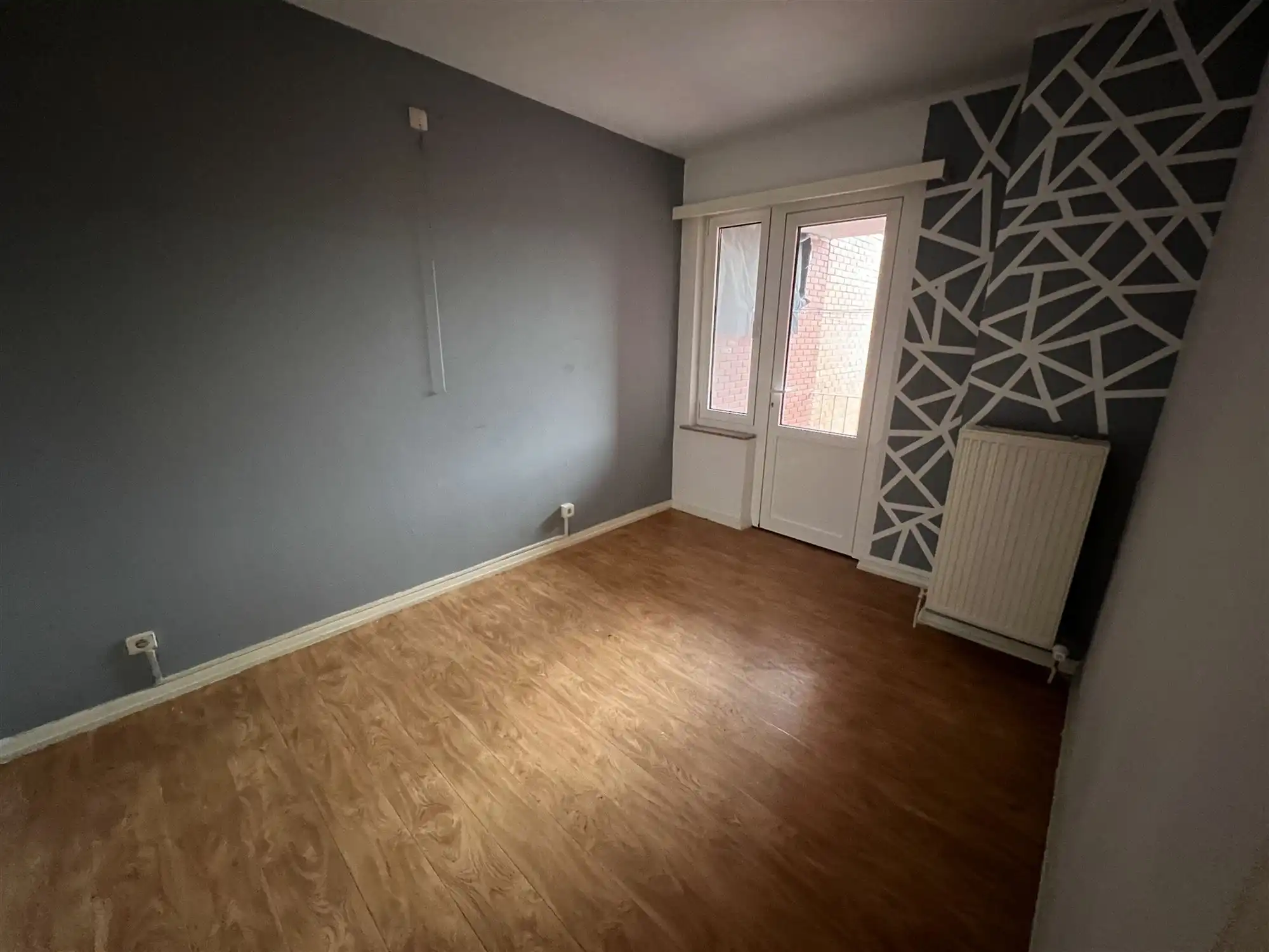 Opbrengsteigendom met 4 appartementen en tuin foto 9