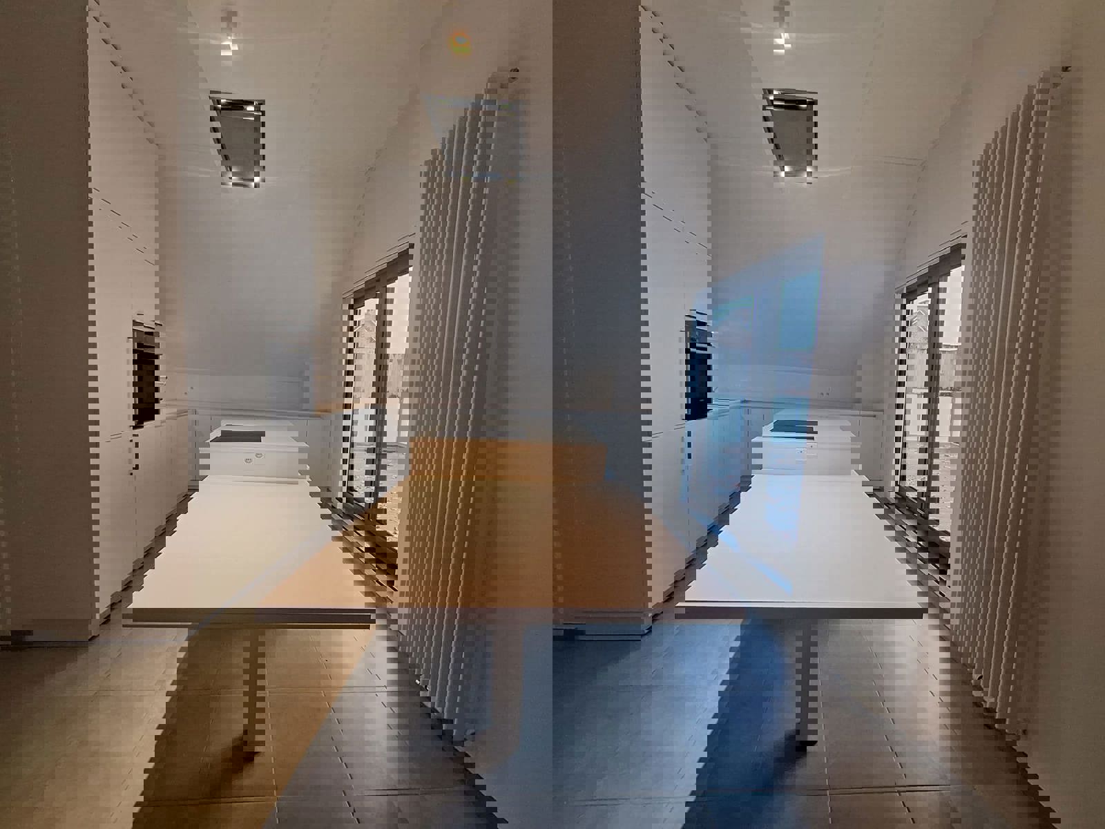 Modern en energiezuinig 2-slaapkamerappartement met carport en ruim terras (geen gemeenschappelijke huurlasten) foto 4