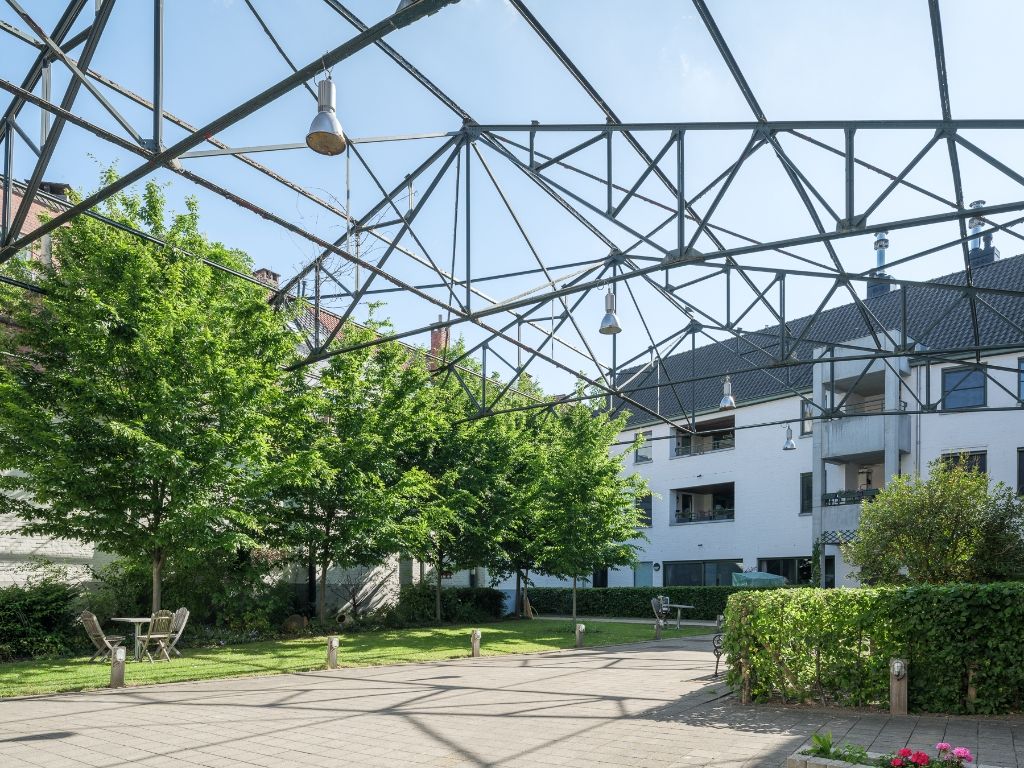 Bijzondere eigendom gelegen in een voormalige industriële katoenspinnerij. foto 14