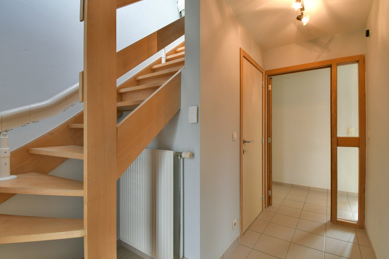 Halfopen gezinswoning met drie slaapkamers foto 13