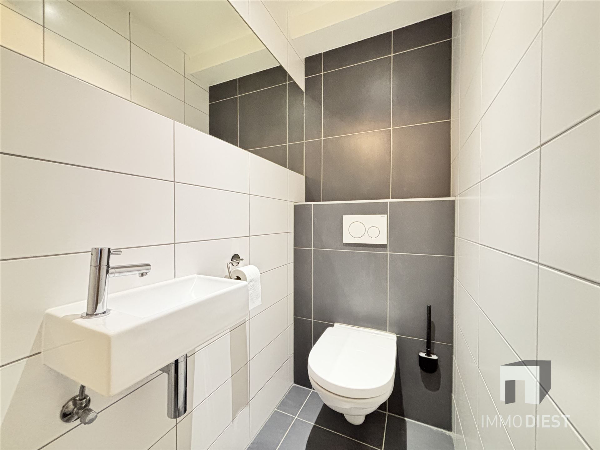 Ruim appartement op de tweede verdieping in het centrum van Tessenderlo foto 14