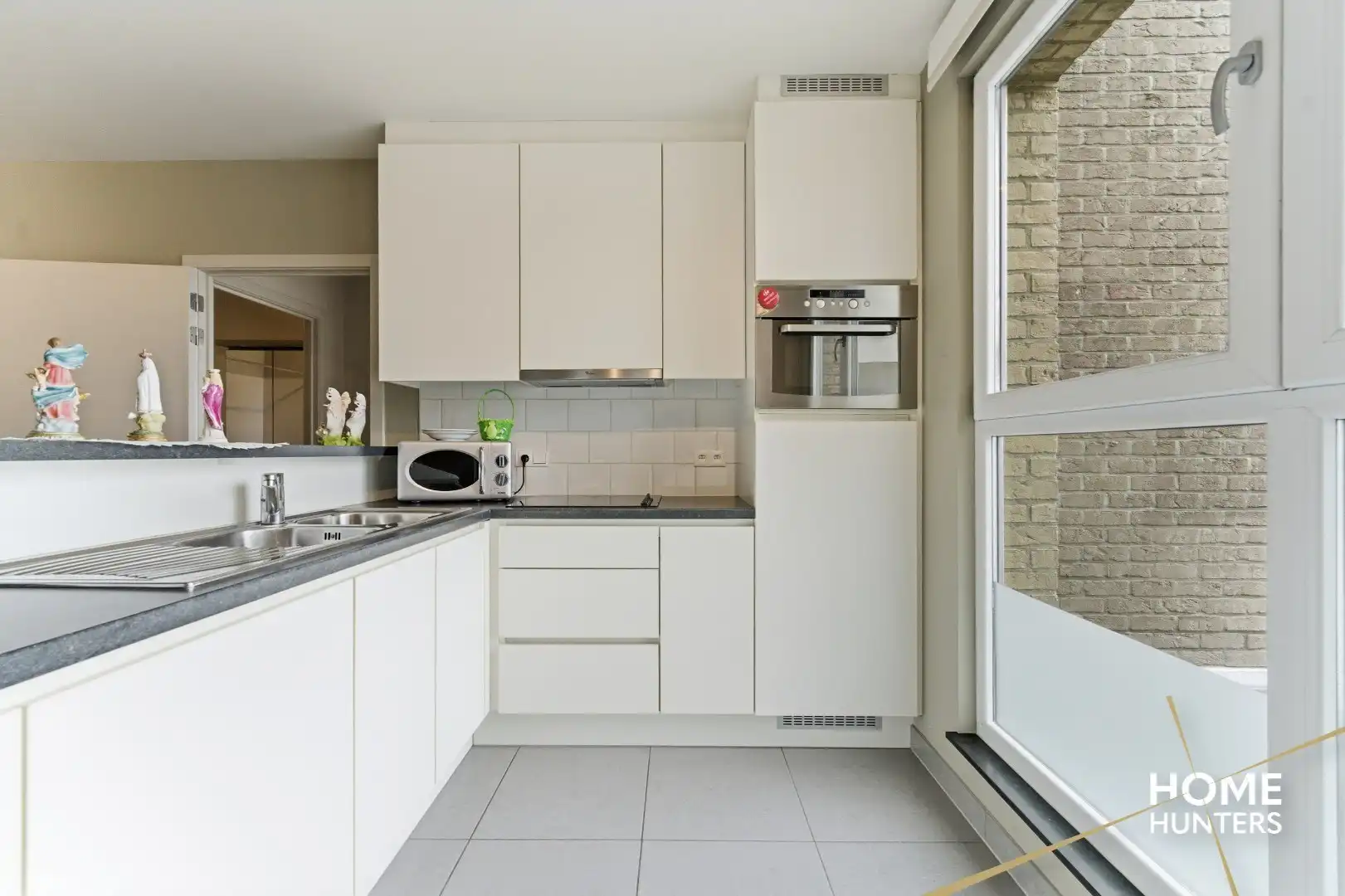 Gezellig appartement met 2 slaapkamers en terras op markt van Houthulst! foto 7