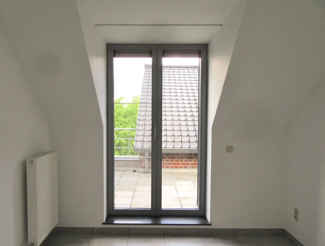 Modern duplex appartement, open indeling, 2x slpk, 2x terras, kelder + parkeerplek + lift aanwezig foto 11