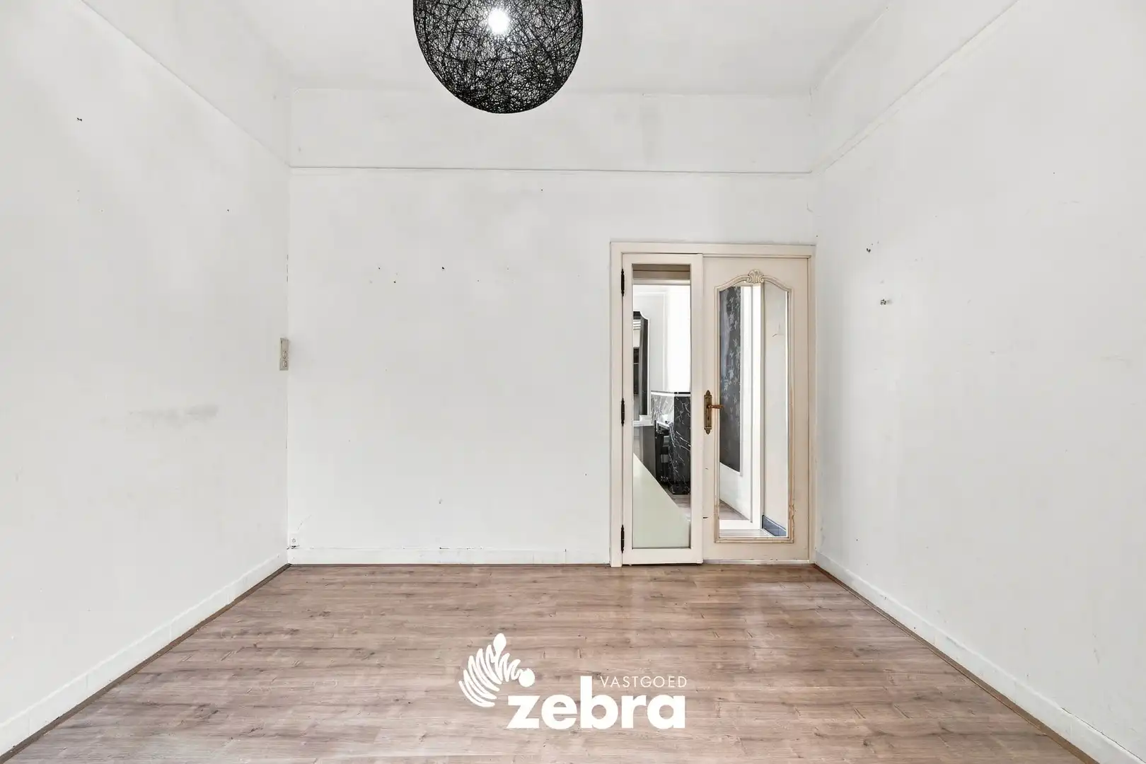 Op te frissen woning met 4 slaapkamers en ruime tuin met uitweg te Tielt! foto 10