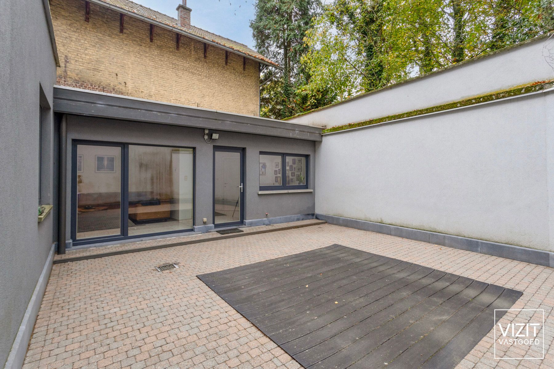 Gelijkvloers appartement met ruime koer te centrum Ninove foto 2