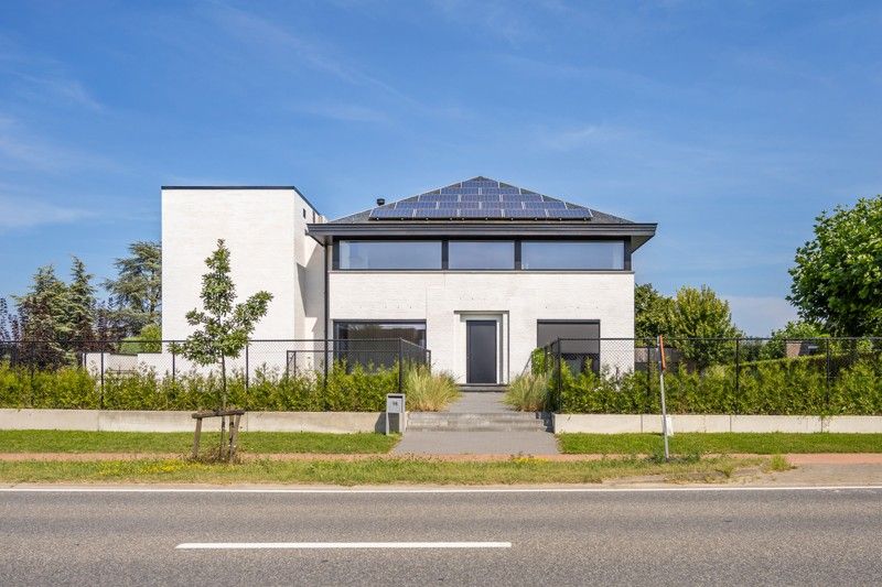 Zeer energiezuinig, gelijkvloers appartement met tuin, poolhouse en zwemvijver foto 42