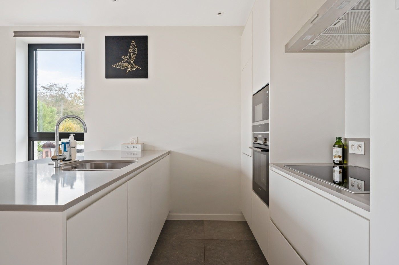 Instapklaar app. op 1ste verd. met 2 slpk., terras en autostaanplaats foto 9