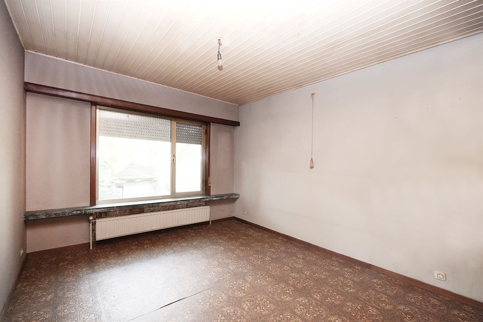 Laagbouw met grote tuin zonder renovatieplicht! foto 6
