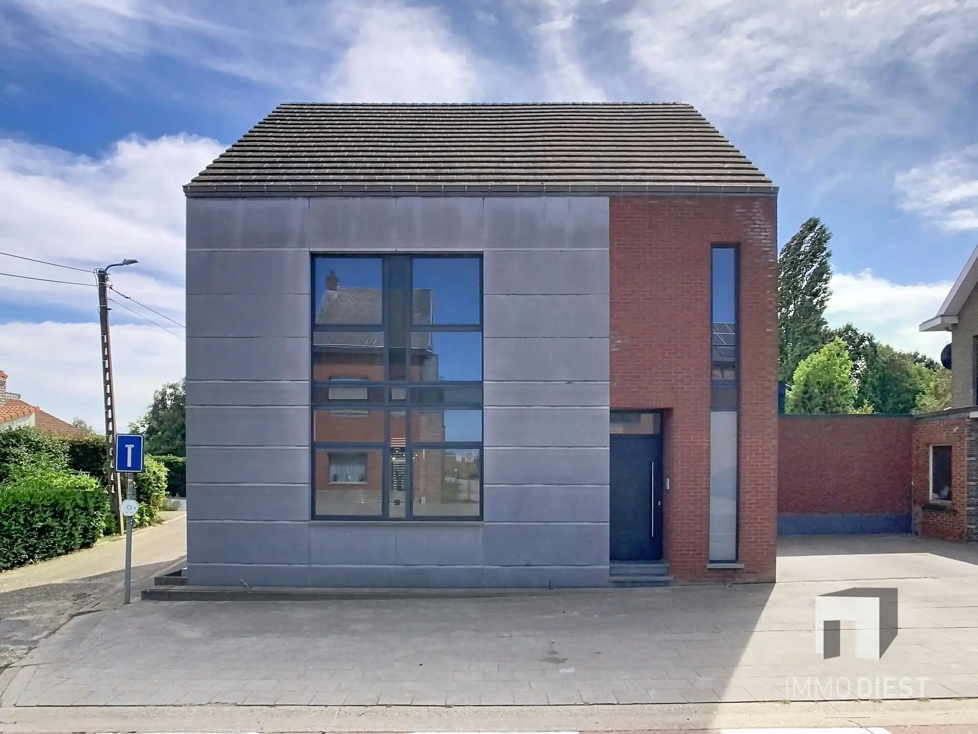 Moderne, lichtrijke woning met aangename tuin aan de voet van hartje Scherpenheuvel. foto 40