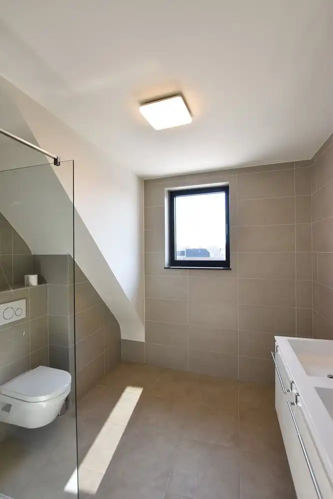 Nieuwbouwappartement met één slaapkamer en een ruim Z-terras te Broechem! foto 9
