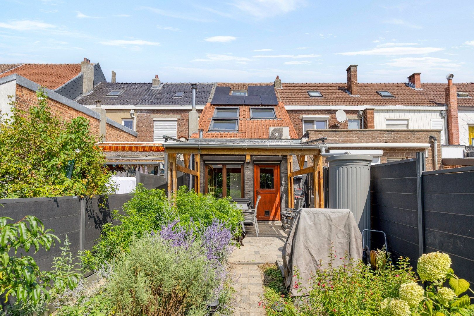 Energiezuinige woning met 3 slaapkamers, bureau, tuin en 2 garageboxen foto 9