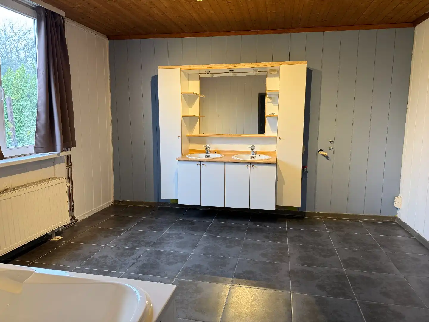 Laagbouwwoning met 2 slpk, carport en tuin foto 13