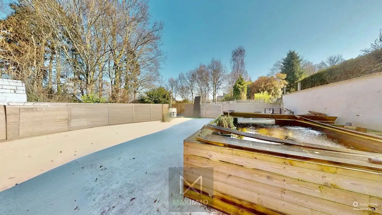 Gelijkvloerse bungalow met loods van 180 m² in het centrum van Marke foto 25