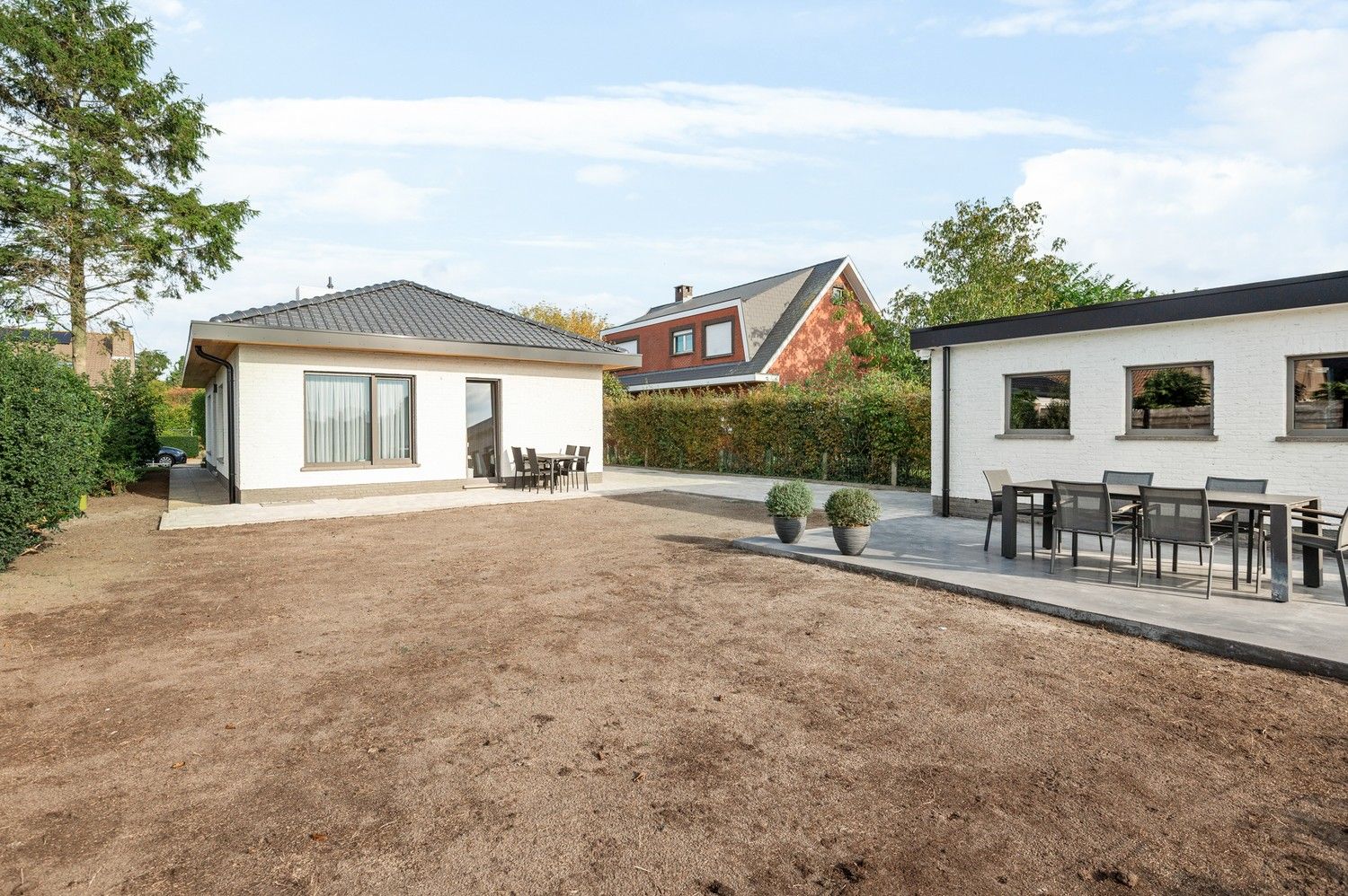 Prachtige totaalrenovatie met 2 à 3 SLPKS en een ruime tuin in Kapellen! foto 18