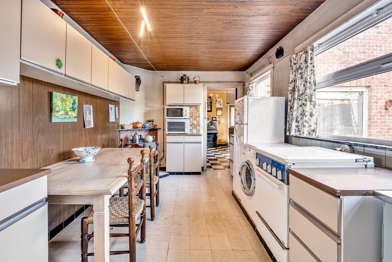 Gezellige, te renoveren, woning met charmante tuin aan een groenzone foto 17