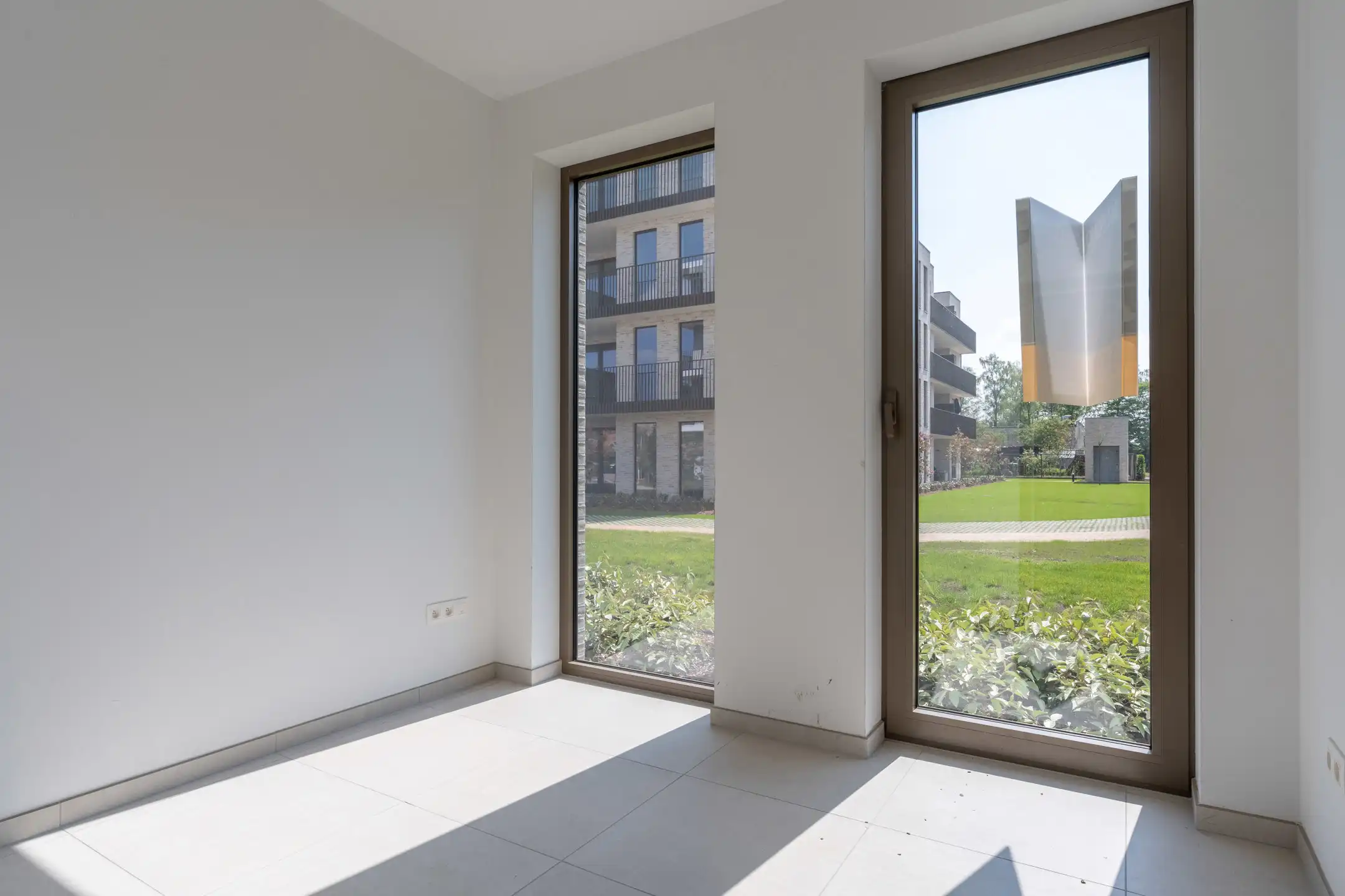 Knap energiezuinig appartement met tof terras foto 19