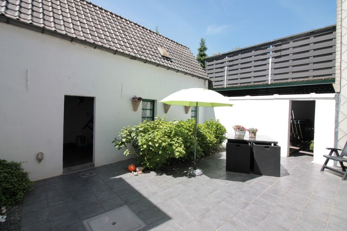 Zeer charmante rijwoning foto 16