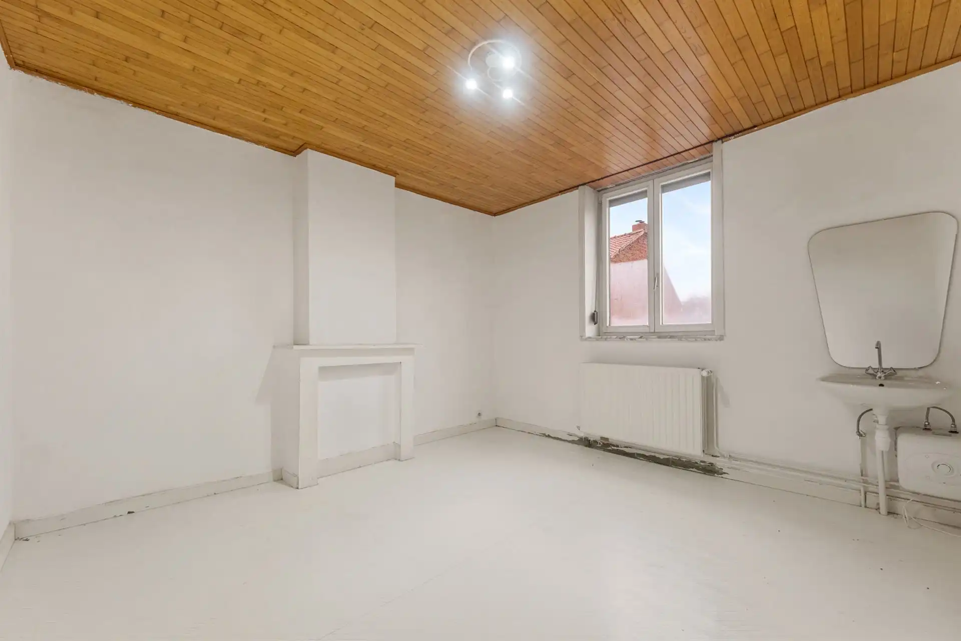 Ideaal gelegen gezinswoning met drie slaapkamers en garage foto 4