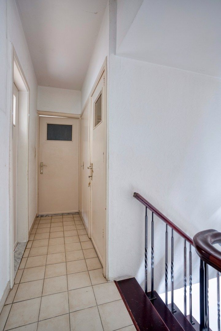Te renoveren halfopen bebouwing in Kessel-Lo met 4 slaapkamers en garage - 202 m² foto 11