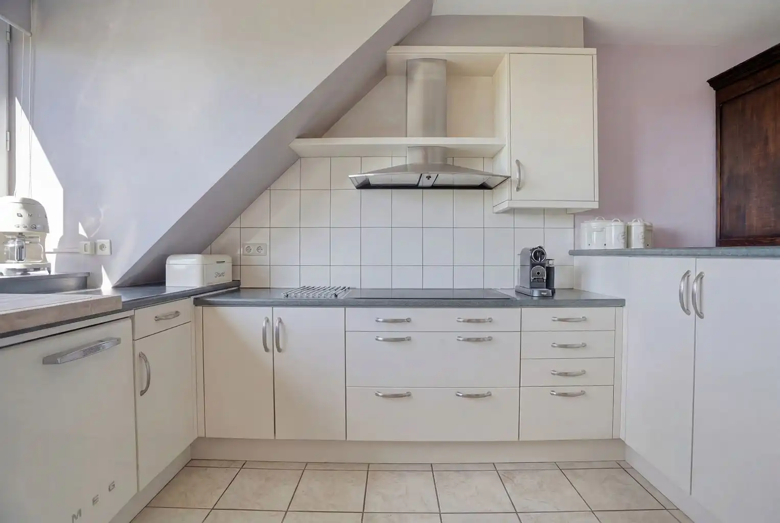 Prachtig duplexappartement met 3 slaapkamers, 2 terrassen en een inpandige garagebox, rustig gelegen op wandelafstand van het centrum van Maaseik. foto 8