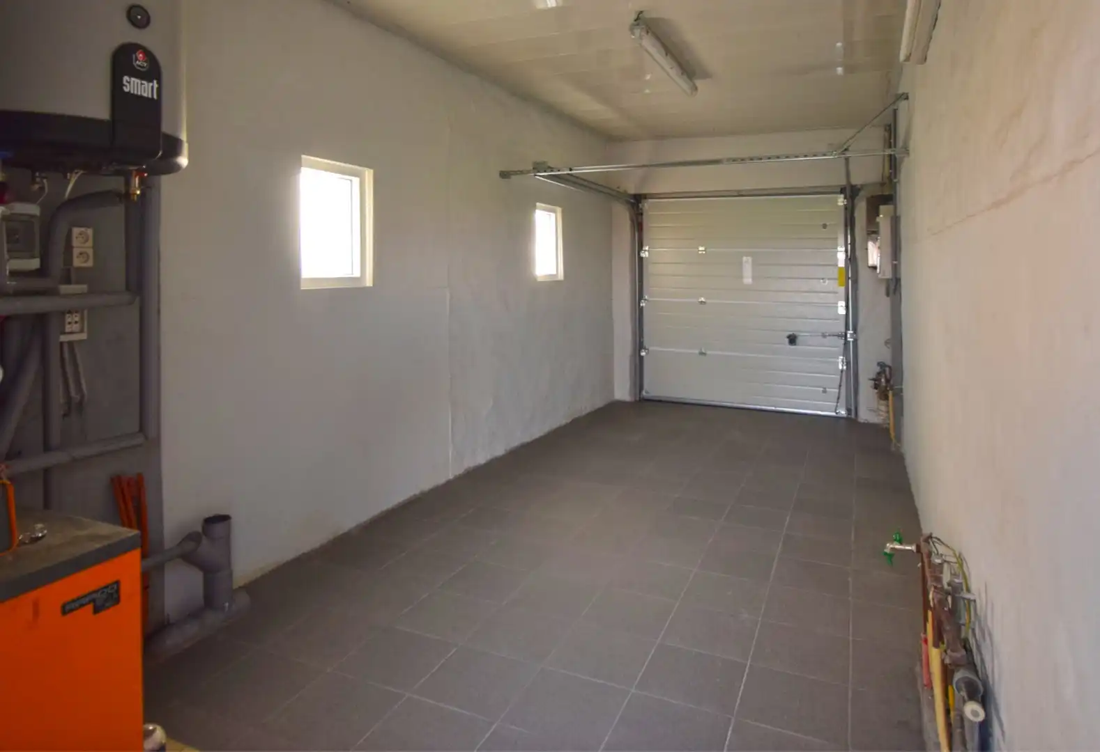 COMFORTABELE WONING MET GARAGE EN GROTE TUIN foto 10