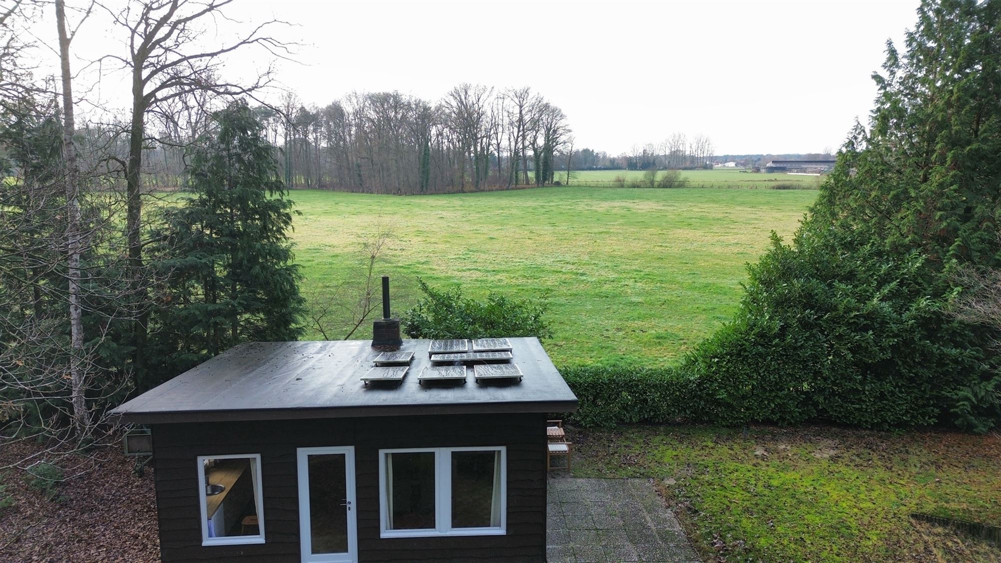 Charmante chalet met privatieve vijver op idyllisch perceel foto 46