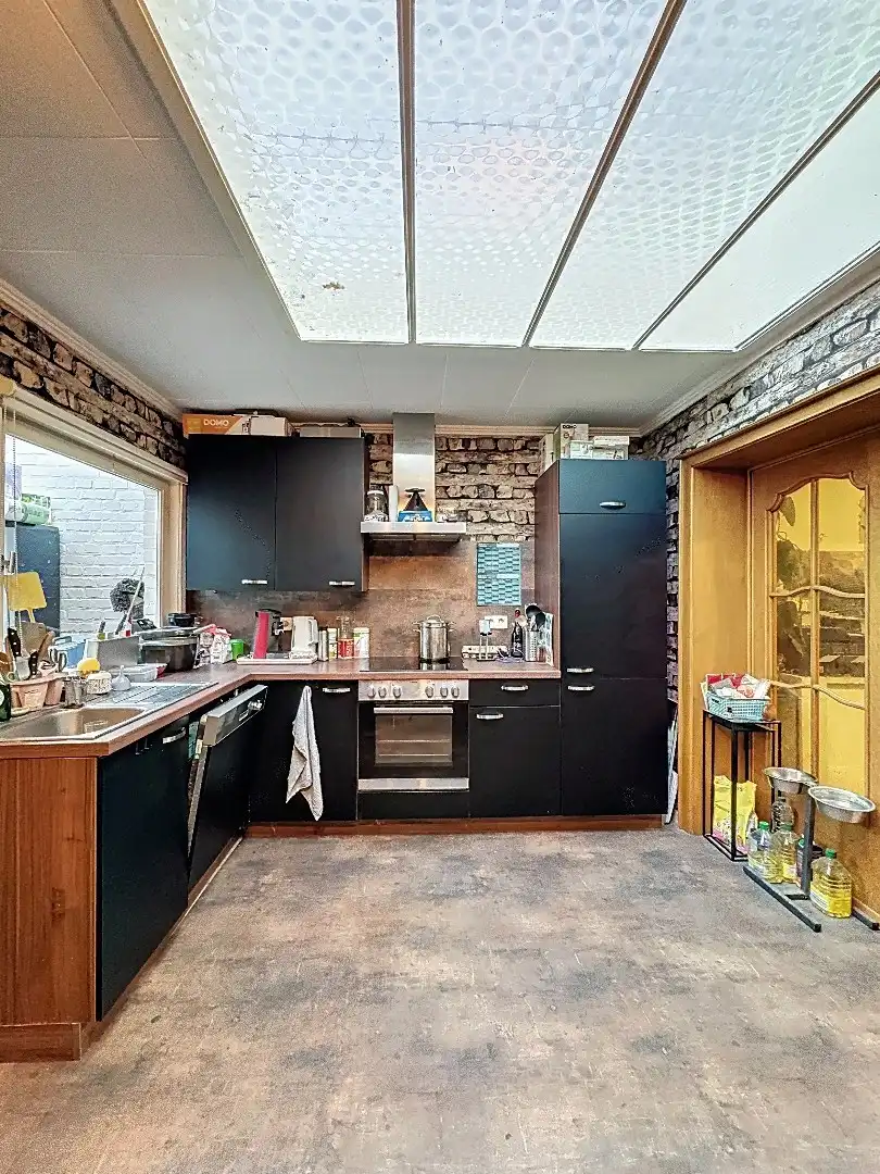 Gezellig wonen in Tienen: praktische rijwoning met terras en 3 slaapkamers foto 7