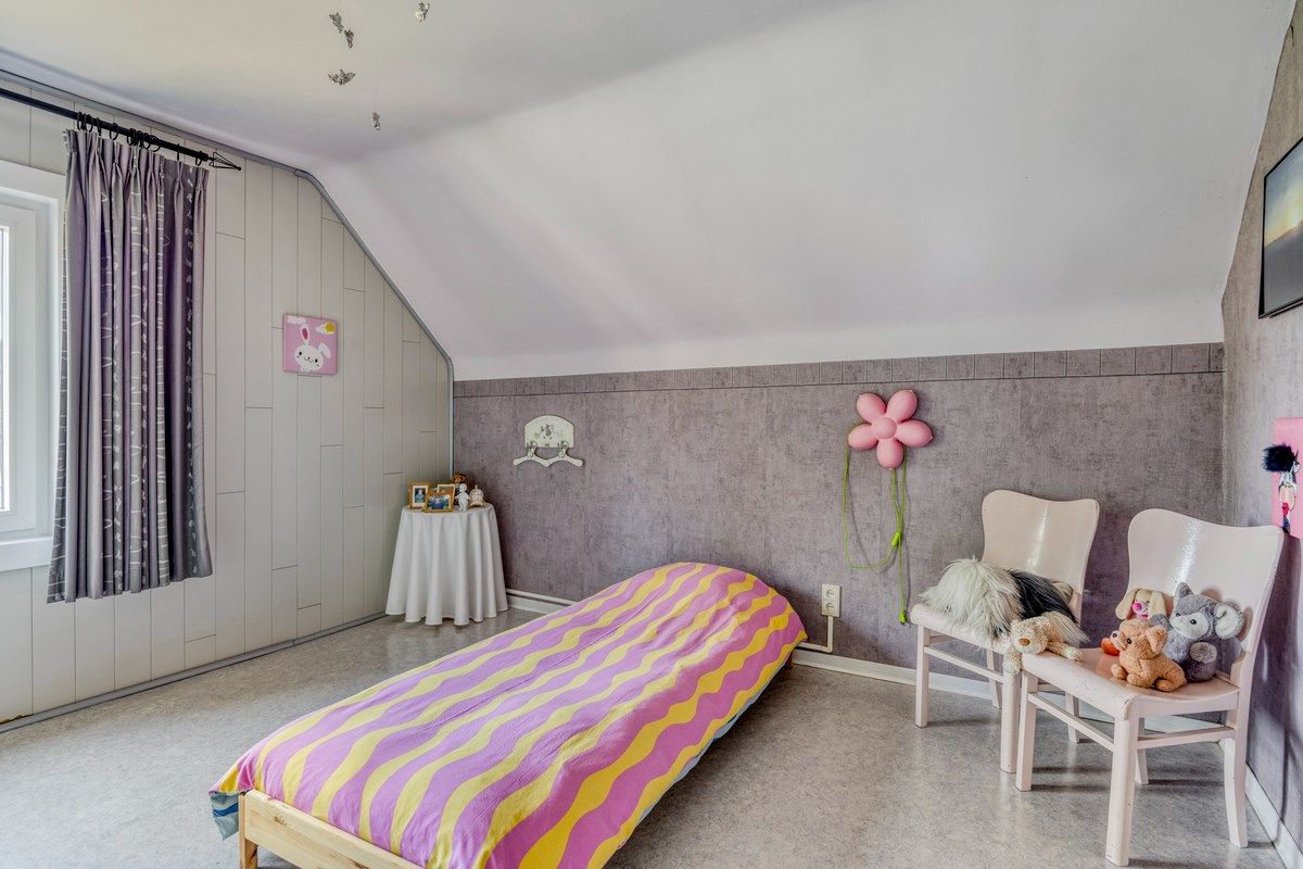 Rustig gelegen woning met oa 4 slpks op een mooi breed perceel van 21 are. foto 19