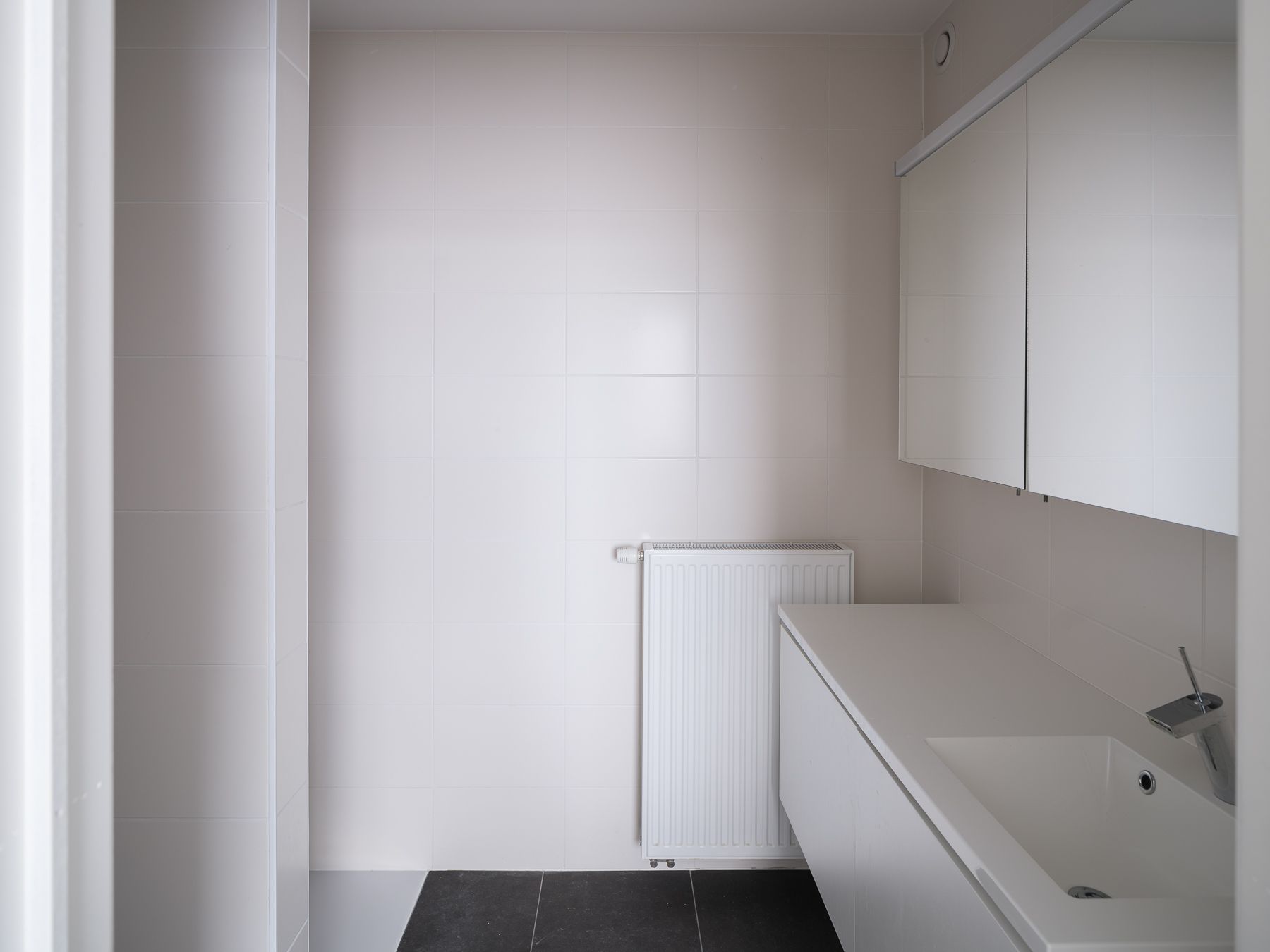 Instapklaar éénslaapkamerappartement met terras en autostaanplaats foto 12