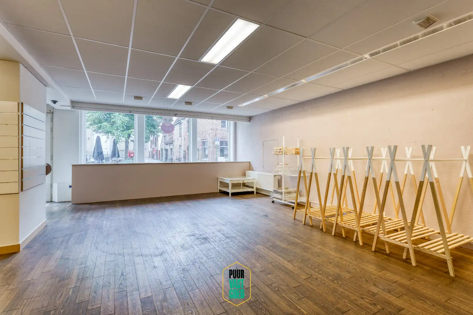 Riant appartement en studio boven grote handelsruimte  foto 4