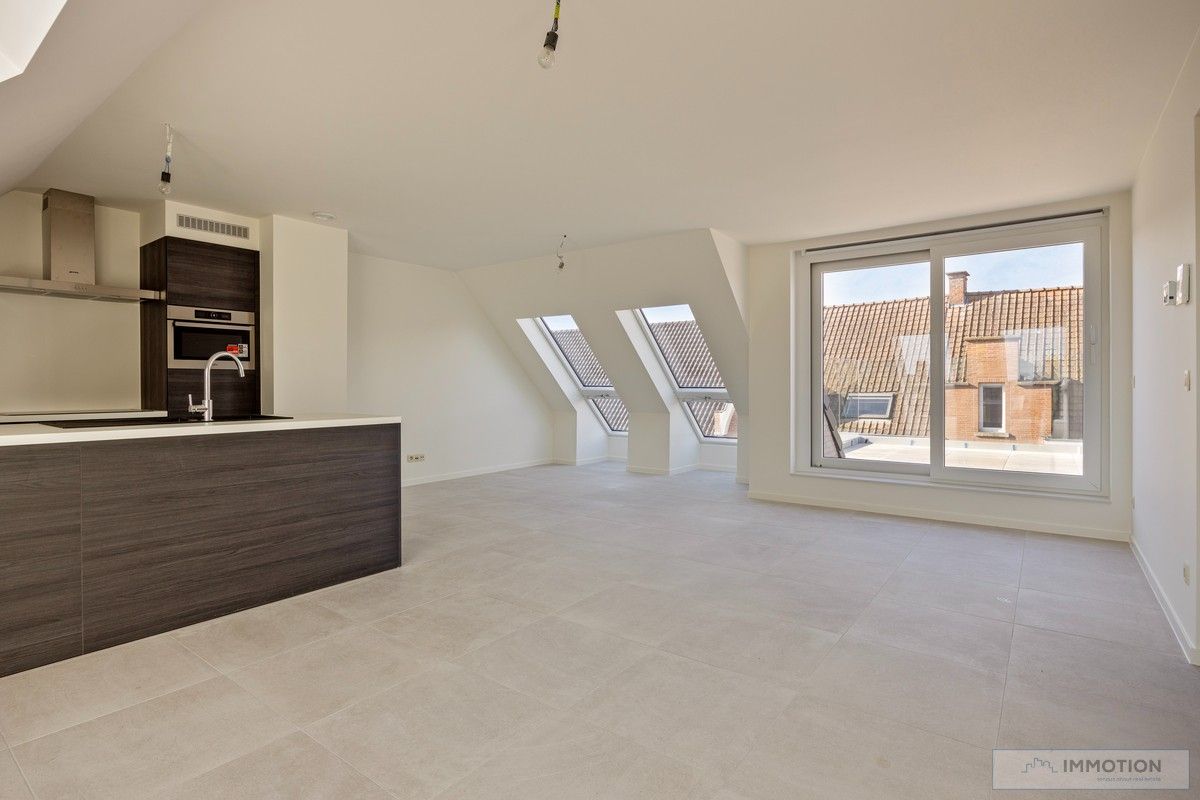 Toffe penthouse met zalig terras in Kuurne foto {{pictureIndex}}